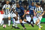 MILAN, ITALY - APRIL 16: Sisenando Maicon Douglas of FC Internazionale Milano surrounded by players of Juventus FC during the Serie A match between FC Internazionale Milano and Juventus FC at Stadio Giuseppe Meazza on April 16, 2010 in Milan, Italy.  (Photo by Massimo Cebrelli/Getty Images)