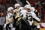 OTTAWA, ON - APRIL 18:  Alex Goligoski #3, Evgeni Malkin #71, Sidney Crosby #87,  Bill Guerin #13 and Chris Kunitz #14 of the Pittsburgh Penguins celebrate against the Ottawa Senators during Game 3 of the Eastern Conference Quaterfinals during the 2010 Stanley Cup Playoffs at Scotiabank Place on April 18, 2010 in Ottawa, Canada.  (Photo by Phillip MacCallum/Getty Images)