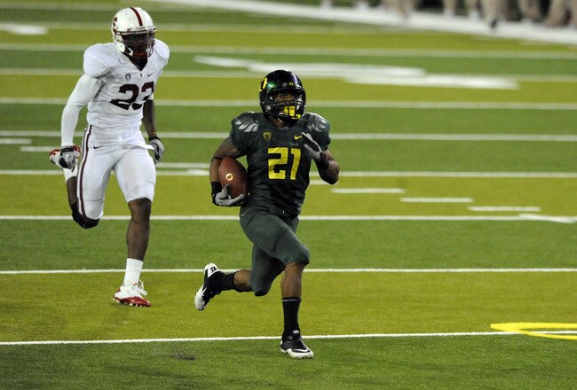 EUGENE, OR - OCTOBER 2: Running back LaMichael James #21 of the Oregon Ducks heads for the end zone on a 76-yard touchdown run  the fourth quarter of the game against the Stanford Cardinal at Autzen Stadium on October 2, 2010 in Eugene, Oregon. James had 257 yards and scored three touchdowns as the Ducks won the game 52-31. (Photo by Steve Dykes/Getty Images)