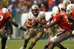 MIAMI - OCTOBER 04:  Quarterback Christian Ponder #7 of the Florida State Seminoles scrambles against the Miami Hurricanes at Dolphin Stadium on October 4, 2008 in Miami, Florida. Florida State defeated Miami 41-39.  (Photo by Doug Benc/Getty Images)