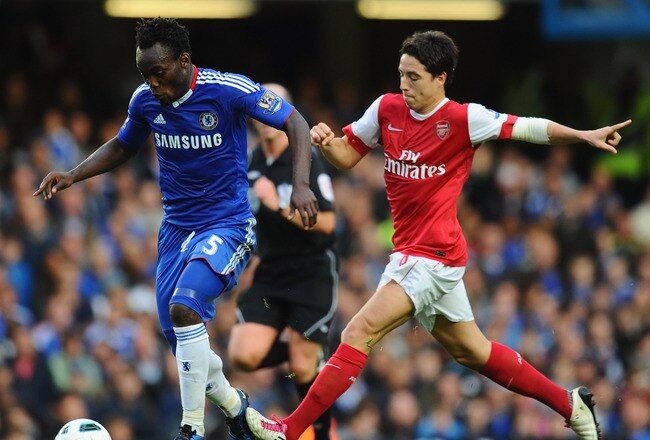 LONDON, ENGLAND - OCTOBER 03:  Michael Essien of Chelsea is challenged by Samir Nasri of Arsenal during the Barclays Premier League match between Chelsea and Arsenal at Stamford Bridge on October 3, 2010 in London, England.  (Photo by Mike Hewitt/Getty Images)