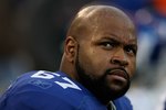 EAST RUTHERFORD, NJ - NOVEMBER 8:  Kareem McKenzie #67 of the New York Giants sits on the bench against the San Diego Chargers at Giants Stadium on November 8, 2009 in East Rutherford, New Jersey. The Chargers defeated the Giants 21-20.  (Photo by Nick Laham/Getty Images)