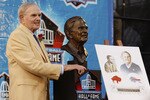 CANTON, OH - AUGUST 8: Buffalo Bills founder Ralph Wilson Jr. poses with his bust at his induction into the Pro Football Hall of Fame during the 2009 enshrinement ceremony at Fawcett Stadium on August 8, 2009 in Canton, Ohio. (Photo by Joe Robbins/Getty Images)