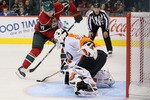 ST PAUL, MN - SEPTEMBER 25:  Goaltender Sergei Bobrovsky #35 of the Philadelphia Flyers pokes the puck away from Casey Wellman #17 of the Minnesota Wild during the shootout at Xcel Energy Center on September 25, 2010 in St Paul, Minnesota. The Flyers defeated the Wild 3-2 in a shootout.  (Photo by Jeff Gross/Getty Images)