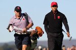 NEWPORT, WALES - OCTOBER 04:  Tiger Woods of the USA walks with caddie Steve Williams to the 1st green in the singles matches during the 2010 Ryder Cup at the Celtic Manor Resort on October 4, 2010 in Newport, Wales. (Photo by Ross Kinnaird/Getty Images)