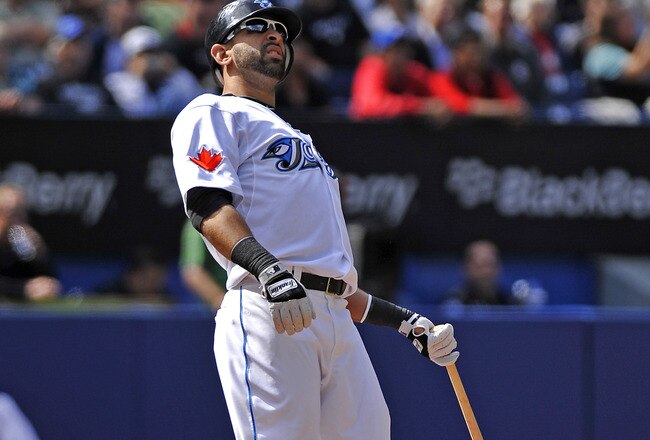 TORONTO - SEPTEMBER 23:   Jose Bautista #19 of the Toronto Blue Jays watches his foul ball during the game against the Seattle Mariners on September 23, 2010 at Rogers Centre in Toronto, Ontario, Canada. The Blue Jays defeated the Mariners 1-0. (Photo by Brad White/Getty Images)