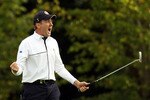 NEWPORT, WALES - OCTOBER 03:  Ian Poulter of Europe celebrates holing a putt on the 15th green  during the  Fourball & Foursome Matches during the 2010 Ryder Cup at the Celtic Manor Resort on October 3, 2010 in Newport, Wales. (Photo by Ross Kinnaird/Getty Images)