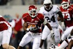 ARLINGTON, TX - OCTOBER 03:  Running back Michael Smith #21 of the Arkansas Razorbacks runs against the Texas A&M Aggies at Cowboys Stadium on October 3, 2009 in Arlington, Texas.  (Photo by Ronald Martinez/Getty Images)