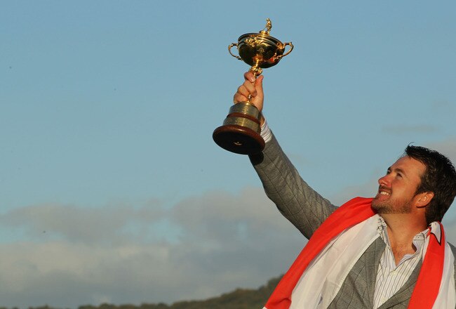 NEWPORT, WALES - OCTOBER 04:  European Team member Graeme McDowell poses with the Ryder Cup following Europe's 14.5 to 13.5 victory over the USA at the 2010 Ryder Cup at the Celtic Manor Resort on October 4, 2010 in Newport, Wales.  (Photo by Jamie Squire/Getty Images)
