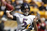 PITTSBURGH - OCTOBER 03: Joe Flacco #5 of the Baltimore Ravens throws a pass behind LaMarr Woodley #56 of the Pittsburgh Steelers on October 3, 2010 at Heinz Field in Pittsburgh, Pennsylvania. Baltimore won the game 17-14. (Photo by Gregory Shamus/Getty Images)
