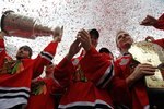 CHICAGO - JUNE 11: (L-R) Dave Bolland #36, Jonathan Toews #19, and Patrick Kane #88 celebrate with the crowd during the Chicago Blackhawks Stanley Cup victory parade and rally on June 11, 2010 in Chicago, Illinois. (Photo by Jonathan Daniel/Getty Images)