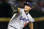 PHOENIX - SEPTEMBER 24:  Starting pitcher Clayton Kershaw #22 of the Los Angeles Dodgers pitches against the Arizona Diamondbacks during the Major League Baseball game at Chase Field on September 24, 2010 in Phoenix, Arizona.  The Dodgers defeated the Diamondbacks 3-1.   (Photo by Christian Petersen/Getty Images)