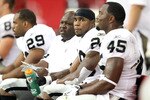 GLENDALE, AZ - SEPTEMBER 26:  Runningback Darren McFadden #20 of the Oakland Raiders sits on the sidelines during the NFL game against the Arizona Cardinals at the University of Phoenix Stadium on September 26, 2010 in Glendale, Arizona.  The Cardinals defeated the Raiders 24-23.  (Photo by Christian Petersen/Getty Images)