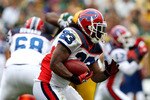 GREEN BAY, WI - SEPTEMBER 19: Marshawn Lynch #23 of the Buffalo Bills runs against the Green Bay Packers at Lambeau Field on September 19, 2010 in Green Bay, Wisconsin. The Packers defeated the Bills 34-7. (Photo by Jonathan Daniel/Getty Images)