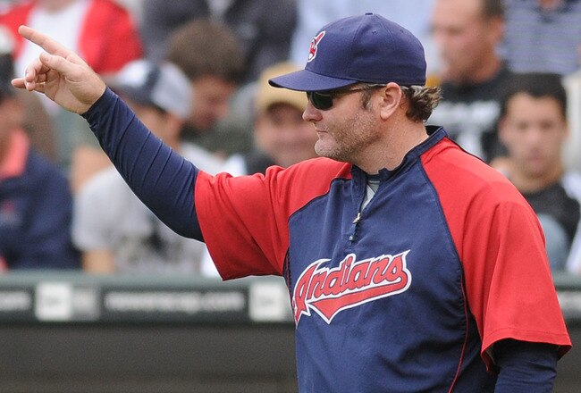 CHICAGO - SEPTEMBER 28: Clevelan Indians Manager Eric Wedge makes a pithcing change against the Chicago White Sox during the sixth inning at U.S. Cellular Field on September 28, 2008 in Chicago, Illinois. The White Sox defeated the Indians 5-1. (Photo by David Banks/Getty Images)