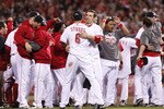 CINCINNATI, OH - SEPTEMBER 28: Joey Votto #19 and Drew Stubbs #6 of the Cincinnati Reds celebrate after Jay Bruce's walk off home run against the Houston Astros at Great American Ball Park on September 28, 2010 in Cincinnati, Ohio. The Reds won 3-2 to clinch the NL Central Division title. (Photo by Joe Robbins/Getty Images)