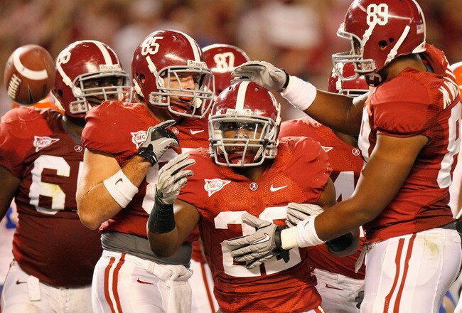 TUSCALOOSA, AL - OCTOBER 02:  Mark Ingram #22 of the Alabama Crimson Tide celebrates his touchdown against the Florida Gators with Preston Dial #85 and Michael Williams #89 at Bryant-Denny Stadium on October 2, 2010 in Tuscaloosa, Alabama.  (Photo by Kevin C. Cox/Getty Images)