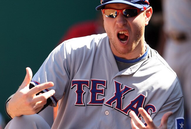 OAKLAND, CA - SEPTEMBER 25:  Josh Hamilton #32 of the Texas Rangers jokes around in the dugout before their game against the Oakland Athletics at the Oakland-Alameda County Coliseum on September 25, 2010 in Oakland, California.  (Photo by Ezra Shaw/Getty Images)