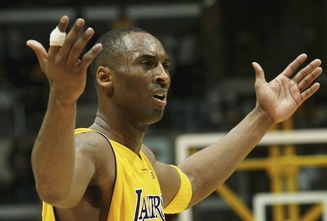 LOS ANGELES - JANUARY 27:   Kobe Bryant #8 of the Los Angeles Lakers complains about a no call in the game with the Golden State Warriors on January 27, 2006 at Staples Center in Los Angeles, California. The Lakers won 106-105 in overtime. NOTE TO USER: User expressly acknowledges and agrees that, by downloading and or using this photograph, User is consenting to the terms and conditions of the Getty Images License Agreement.   (Photo by Stephen Dunn /Getty Images)