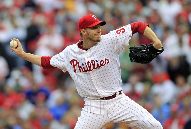 PHILADELPHIA - OCTOBER 06:  Roy Halladay #34 of the Philadelphia Phillies delivers in Game 1 of the NLDS against the Cincinnati Reds at Citizens Bank Park on October 6, 2010 in Philadelphia, Pennsylvania.  (Photo by Chris Trotman/Getty Images)