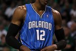 BOSTON - MAY 28:  Dwight Howard of the Orlando Magic looks on against the Boston Celtics in Game Six of the Eastern Conference Finals during the 2010 NBA Playoffs at TD Garden on May 28, 2010 in Boston, Massachusetts.  NOTE TO USER: User expressly acknowledges and agrees that, by downloading and/or using this Photograph, user is consenting to the terms and conditions of the Getty Images License Agreement.  (Photo by Jim Rogash/Getty Images)