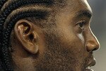 EAST RUTHERFORD, NJ - SEPTEMBER 02:  Randy Moss #81 of the New England Patriots looks on against the New York Giants on September 2, 2010 at the New Meadowlands Stadium in East Rutherford, New Jersey. The Giants defeated the Patriots 20-17.  (Photo by Jim McIsaac/Getty Images)