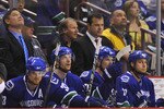 VANCOUVER, CANADA - MAY 11:  Henrik Sedin #33, Mikael Samuelsson #26, Daniel Sedin #22 and Kyle Wellwood #42 of the Vancouver Canucks along with coaches Ryan Walter and Alain Vigneault sit on the bench during the final minute of play against the Chicago Blackhawks during the third period in Game Six of the Western Conference Semifinals during the 2010 NHL Stanley Cup Playoffs on May 11, 2010 at General Motors Place in Vancouver, British Columbia, Canada. The Blackhawks defeated the Canucks 5-1 to win the series 4-2. (Photo by Rich Lam/Getty Images)