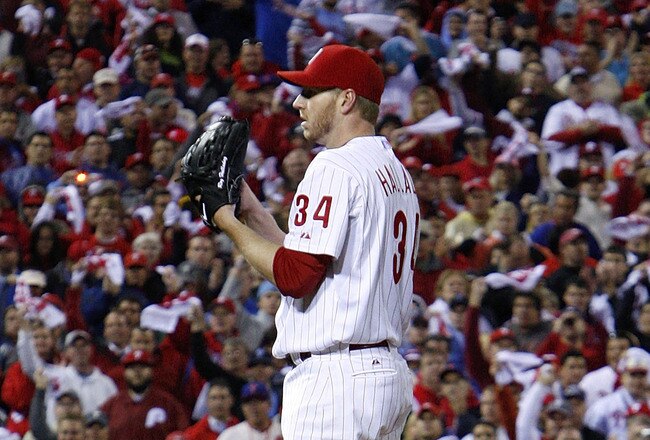 PHILADELPHIA - OCTOBER 06:  Roy Halladay #34 of the Philadelphia Phillies delivers in the ninth inning of Game 1 of the NLDS against the Cincinnati Reds at Citizens Bank Park on October 6, 2010 in Philadelphia, Pennsylvania.  (Photo by Jeff Zelevansky/Getty Images)