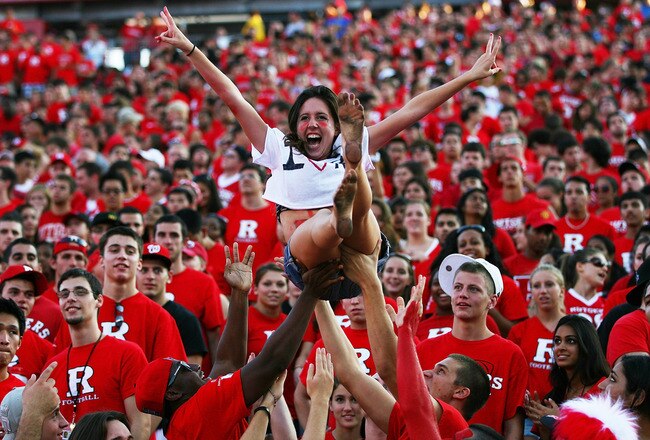 NEW BRUNSWICK, NJ - SEPTEMBER 25:  Jami O'Leary, a sophomore at Rutgers, is thrown into the air by fans during a Rutgers Scarlet Knights game against the North Carolina Tar Heels at Rutgers Stadium on September 25, 2010 in New Brunswick, New Jersey.  (Photo by Andrew Burton/Getty Images)