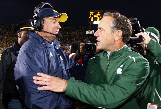 ANN ARBOR, MI - OCTOBER 25: Head coach Mark Dantonio of the Michigan State Spartans shakes hands with head coach Rich Rodriguez of the Michigan Wolverines after a Michigan State 35-21 victory on October 25, 2008 at Michigan Stadium in Ann Arbor, Michigan.  (Photo by Gregory Shamus/Getty Images)