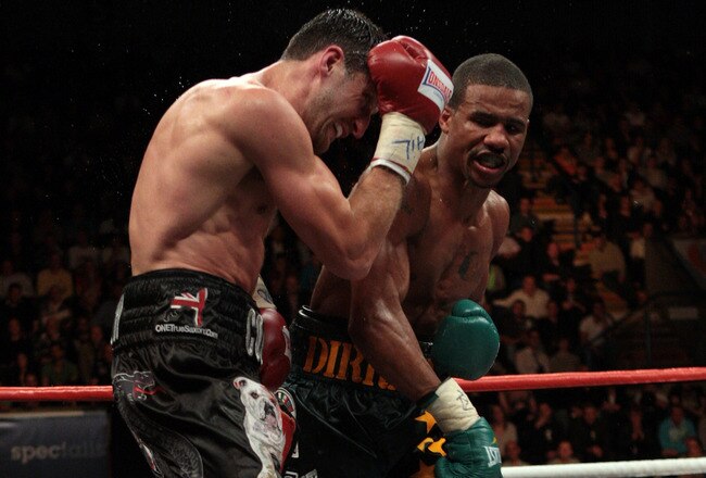 NOTTINGHAM, ENGLAND - OCTOBER 17:  Andre Dirrell attacks Carl Froch during their WBC Super Middleweight fight on October 17, 2009 at Trent FM Arena in Nottingham, England.  (Photo by John Gichigi/Getty Images)