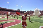 LINCOLN, NEBRASKA - SEPTEMBER 11: The Nebraska Cornhuskers cheerleaders warm up the crowd before the game between between the Nebraska Cornhuskers and the Idaho Vandals at Memorial Stadium on September 4, 2010 in Lincoln, Nebraska. Nebraska defeated Idaho 38-17. (Photo by Eric Francis/Getty Images)