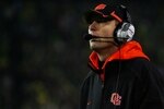 EUGENE,OR - DECEMBER 03:  Head coach Mike Riley of the Oregon State Beavers watches play against the Oregon Ducks at Autzen Stadium on December 3, 2009 in Eugene, Oregon.  (Photo by Tom Hauck/Getty Images)