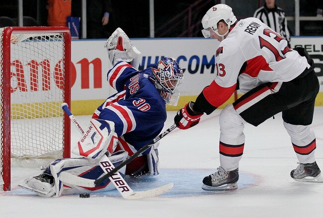 NEW YORK - OCTOBER 01: Goalkeeper Henrik Lundqvist #30 of the New York Rangers makes the winning save on a shot from Peter Regin #13 of the Ottawa Senators during their preseason game on October 1, 2010 at Madison Square Garden in New York City.  (Photo by Chris McGrath/Getty Images)