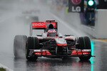 SUZUKA, JAPAN - OCTOBER 09:  Jenson Button of Great Britain and McLaren Mercedes drives as torrential rain descends on the final practice session prior to qualifying for the Japanese Formula One Grand Prix at Suzuka Circuit on October 9, 2010 in Suzuka, Japan.  (Photo by Clive Mason/Getty Images)