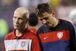 EAST RUTHERFORD, NJ - AUGUST 10:  Bob Bradley, head coach and assistant coach Lubos Kubic of United States Soccer leave the field after a friendly match at the New Meadowlands on August 10, 2010 in East Rutherford, New Jersey.  (Photo by Jeff Zelevansky/Getty Images)