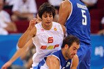 BEIJING - AUGUST 10:  Vasileios Spanoulis #7 of Greece moving around screen set by Ioannis Bourousis #5 of Greece while under pressure from Ricky Rubio #6 of Spain during the day 2 preliminary game at the Beijing 2008 Olympic Games in the Beijing Olympic Basketball Gymnasium on August 10, 2008 in Beijing, China.  (Photo by Phil Walter/Getty Images)