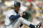 OAKLAND, CA - APRIL 11:  Jaime Moyer #50 of the Seattle Mariners pitches against the Oakland Athletics at Network Associates Coliseum on April 11, 2004 in Oakland, California. The Mariners beat the Athletics 9-4. (Photo by Justin Sullivan/Getty Images)