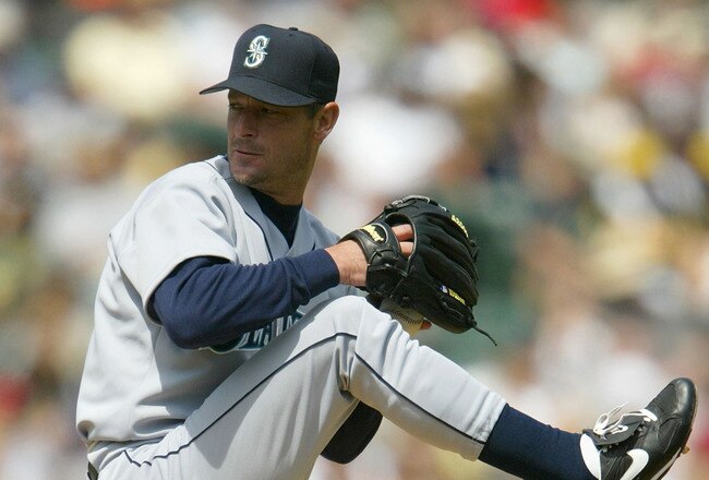 OAKLAND, CA - APRIL 11:  Jaime Moyer #50 of the Seattle Mariners pitches against the Oakland Athletics at Network Associates Coliseum on April 11, 2004 in Oakland, California. The Mariners beat the Athletics 9-4. (Photo by Justin Sullivan/Getty Images)