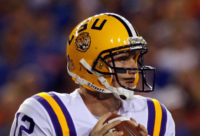 GAINESVILLE, FL - OCTOBER 09:  Quarterback Jarrett Lee #12 of the Louisiana State University Tigers attempts a pass during the game against the Florida Gators at Ben Hill Griffin Stadium on October 9, 2010 in Gainesville, Florida.  (Photo by Sam Greenwood/Getty Images)