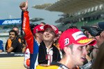 KUALA LUMPUR, MALAYSIA - OCTOBER 09:  Jorge Lorenzo of Spain and Fiat Yamaha Team celebrates the pole position at the end of the qualifying practice of MotoGP of Malaysia at Sepang International Circuit on October 9, 2010 in Kuala Lumpur, Malaysia.  (Photo by Mirco Lazzari gp/Getty Images)