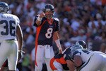 DENVER - SEPTEMBER 19:  Quarterback Kyle Orton #8 of the Denver Broncos runs the offense against the Seattle Seahawks at INVESCO Field at Mile High on September 19, 2010 in Denver, Colorado. The Broncos defeated the Seahawks 31-14.  (Photo by Doug Pensinger/Getty Images)