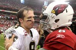 GLENDALE, AZ - OCTOBER 10:  Quarterbacks Drew Brees #9 of the New Orleans Saints and Max Hall #6 of the Arizona Cardinals talk following the NFL game at the University of Phoenix Stadium on October 10, 2010 in Glendale, Arizona. The Cardinals defeated the Saints 30-20.  (Photo by Christian Petersen/Getty Images)