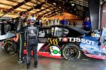 FONTANA, CA - OCTOBER 09:  Danica Patrick, driver of the #7 Tissot Chevrolet, stands in the garage with a crew member after crashing during the NASCAR Nationwide Series CampingWorld.com 300 on October 9, 2010 in Fontana, California.  (Photo by Rusty Jarrett/Getty Images for NASCAR)