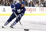 TORONTO - APRIL 6: Tomas Kaberle #15 of the Toronto Maple Leafs moves the puck during a NHL game against the Philadelphia Flyers at the Air Canada Centre on April 6, 2010 in Toronto, Ontario, Canada. (Photo by Abelimages/Getty Images)