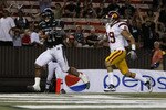 HONOLULU - SEPTEMBER 2:  Kealoha Pilares of the University of Hawaii Warriors  scores a touchdown during secondhalf action at Aloha Stadium September 2, 2010 in Honolulu, Hawaii. (Photo by Kent Nishimura/Getty Images)