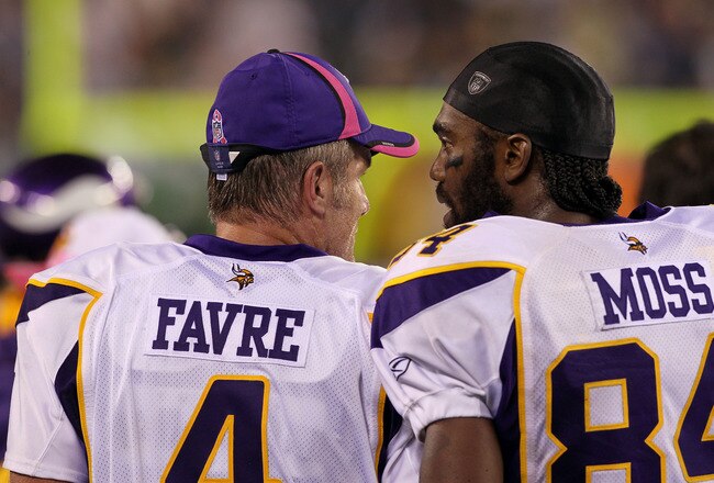 EAST RUTHERFORD, NJ - OCTOBER 11:  (L-R) Brett Favre #4 and Randy Moss #84 of the Minnesota Vikings talk on the sideline against the New York Jets at New Meadowlands Stadium on October 11, 2010 in East Rutherford, New Jersey.  (Photo by Jim McIsaac/Getty Images)