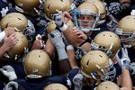 SOUTH BEND, IN - SEPTEMBER 25: Members of the Notre Dame Fighting Irish get ready during warm-ups to play the Stanford Cardinal at Notre Dame Stadium on September 25, 2010 in South Bend, Indiana. Stanford defeated Notre Dame 37-14. (Photo by Jonathan Daniel/Getty Images)