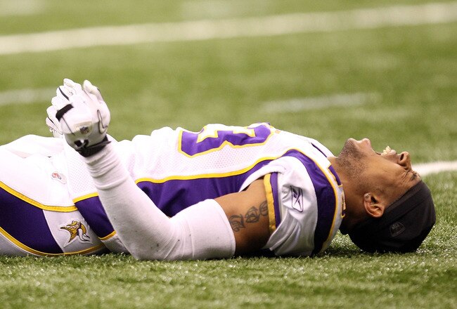 NEW ORLEANS - JANUARY 24:  Cedric Griffin #23 of the Minnesota Vikings reacts after getting injured during the NFC Championship Game at the Louisiana Superdome on January 24, 2010 in New Orleans, Louisiana.  (Photo by Ronald Martinez/Getty Images)