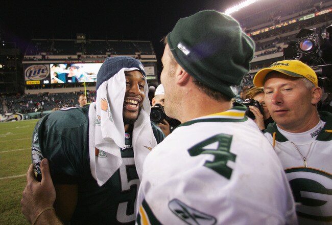 PHILADELPHIA - DECEMBER 5:  Brett Favre #4 of the Green Bay Packers and Donovan McNabb #5 of the Philadelphia Eagles meet on the field following the game at Lincoln Financial Field on December 5, 2004 in Philadelphia, Pennsylvania. The Eagles defeated the Packers 47-17. (Photo by Ezra Shaw/Getty Images)